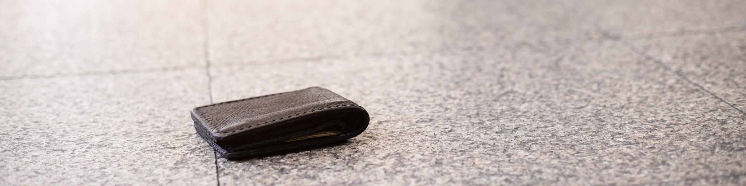 A wallet seemingly abandoned on the floor