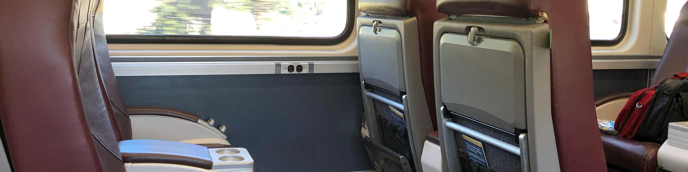 The interior of a train, focusing on seats