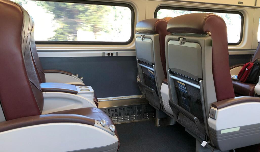 The interior of a train, focusing on seats